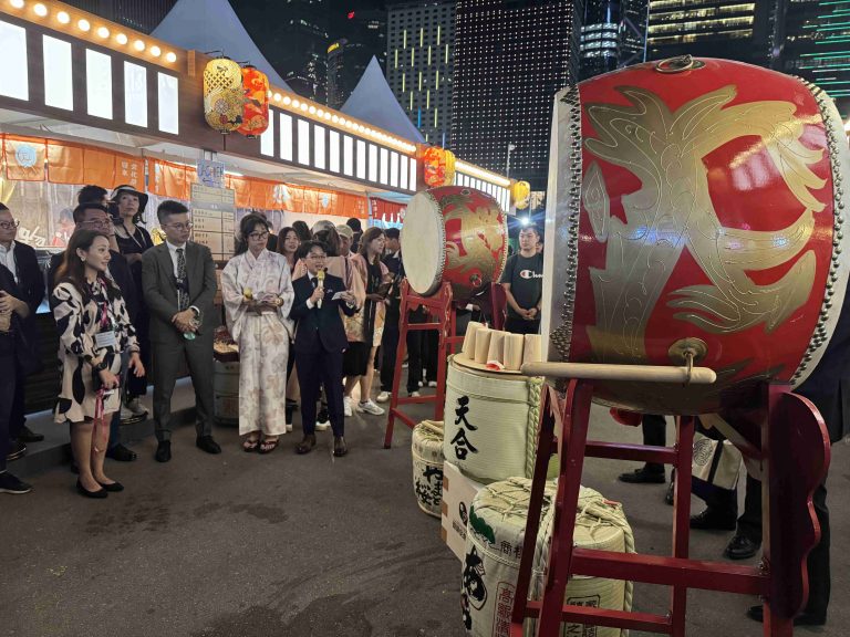 Ocean Ng from HA 3rd Cohort (right) hosts the Opening Ceremony of the Japanese Pavilion at Hong Kong Wine & Dine Festival 2024, demonstrating HA students' professional capabilities in international settings.