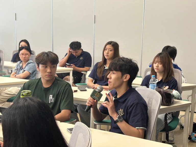 Student asks question during the Q & A session.